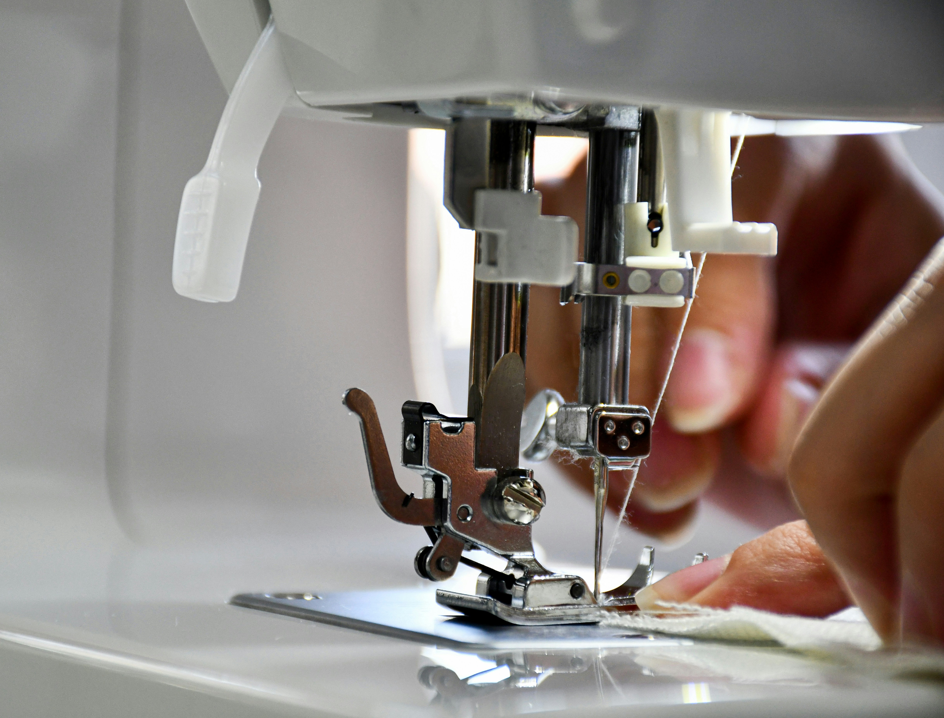 Folded garments awaiting repair